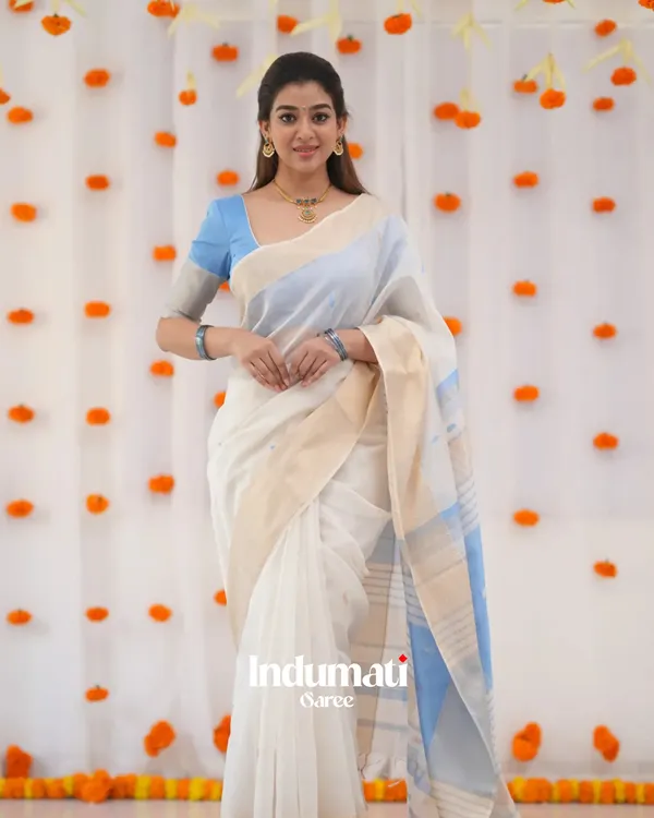 White_Color_Luxury_Edition_Soft_Banarasi_Silk_Saree_with_Classy_Sky_Blue_Color_Blouse_Piece