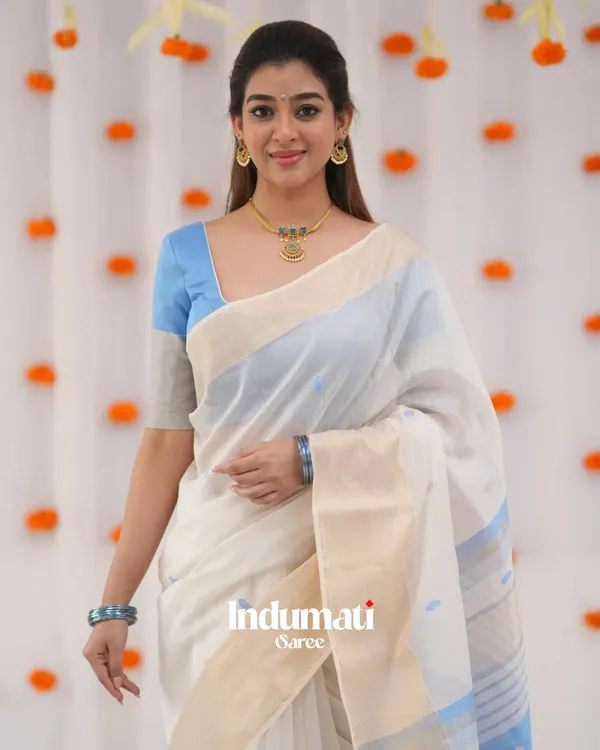 White_Color_Luxury_Edition_Soft_Banarasi_Silk_Saree_with_Classy_Sky_Blue_Color_Blouse_Piece