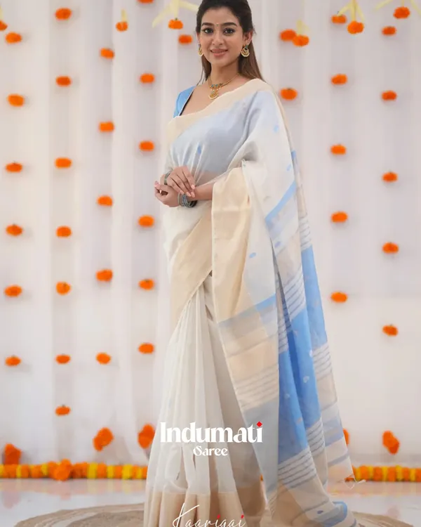 White_Color_Luxury_Edition_Soft_Banarasi_Silk_Saree_with_Classy_Sky_Blue_Color_Blouse_Piece
