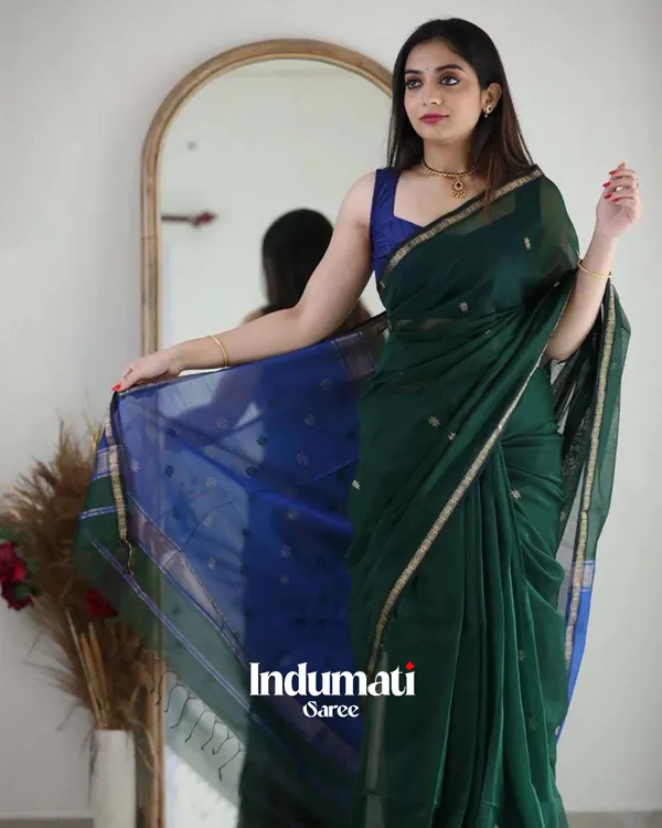 Green_Color_Premium_Cotton_Silk_Saree_With_Classy_Navy_Blue_Blouse_and_tassels