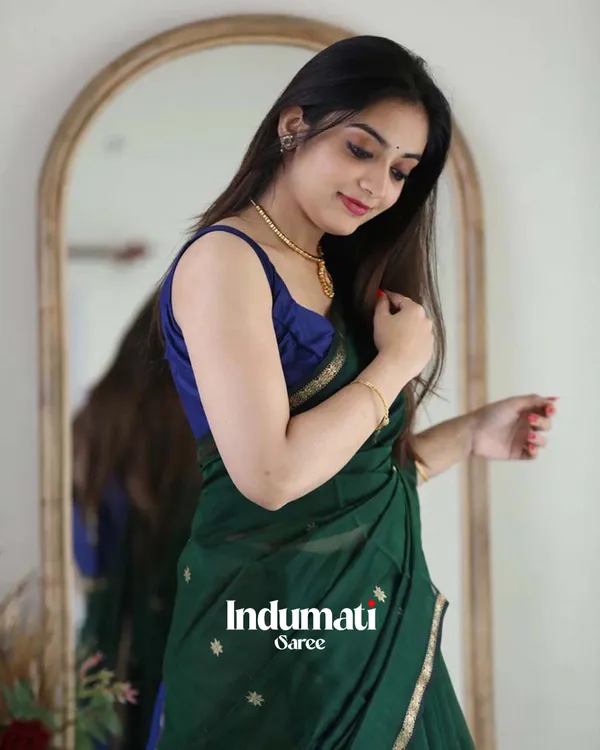 Green_Color_Premium_Cotton_Silk_Saree_With_Classy_Navy_Blue_Blouse_and_tassels