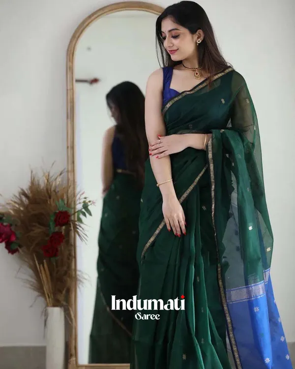 Green_Color_Premium_Cotton_Silk_Saree_With_Classy_Navy_Blue_Blouse_and_tassels
