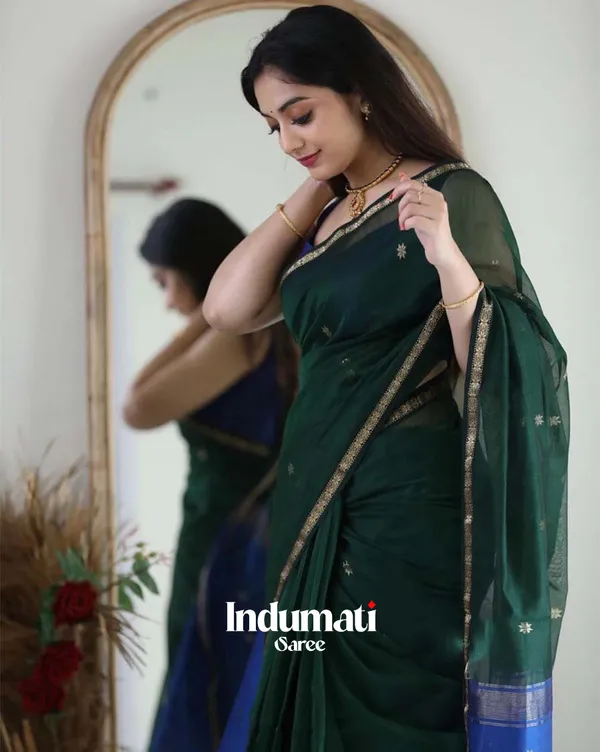 Green_Color_Premium_Cotton_Silk_Saree_With_Classy_Navy_Blue_Blouse_and_tassels