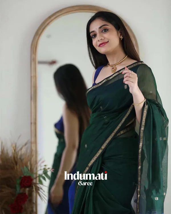 Green_Color_Premium_Cotton_Silk_Saree_With_Classy_Navy_Blue_Blouse_and_tassels