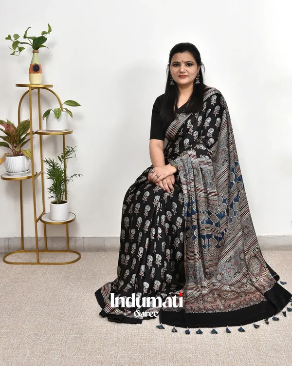 Black_Ajrakh_Printed_Modal_Silk_Premium_Plain_Saree_with_Fancy_Pallu_and_Blouse_Piece