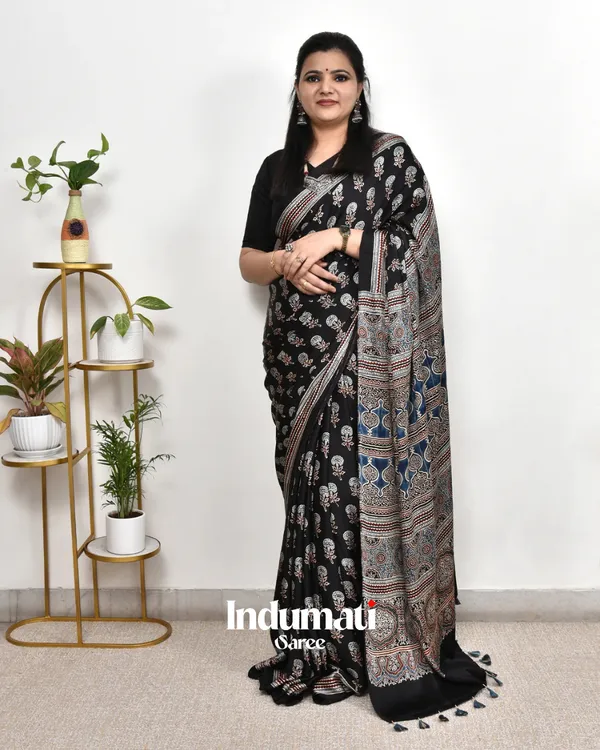 Black_Ajrakh_Printed_Modal_Silk_Premium_Plain_Saree_with_Fancy_Pallu_and_Blouse_Piece