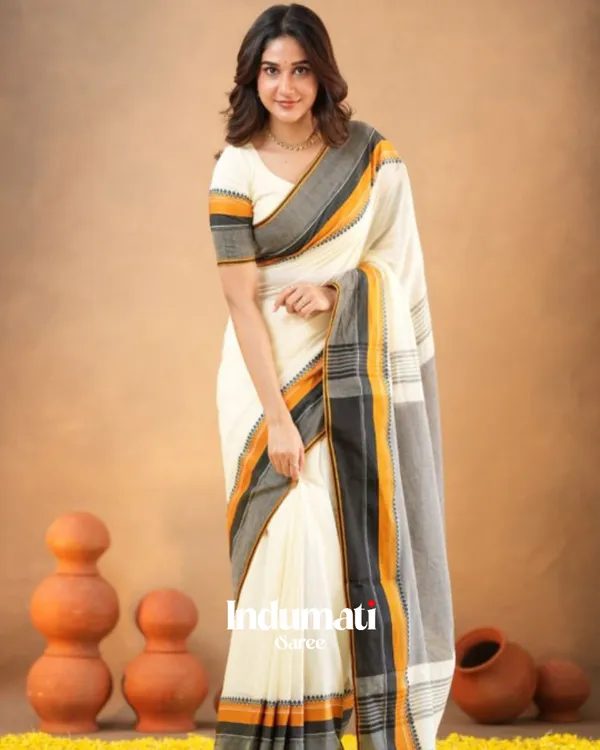 Classic_White_Traditional_Mulmul__Cotton_Saree_with_Contrast_Border_&_Blouse_Piece