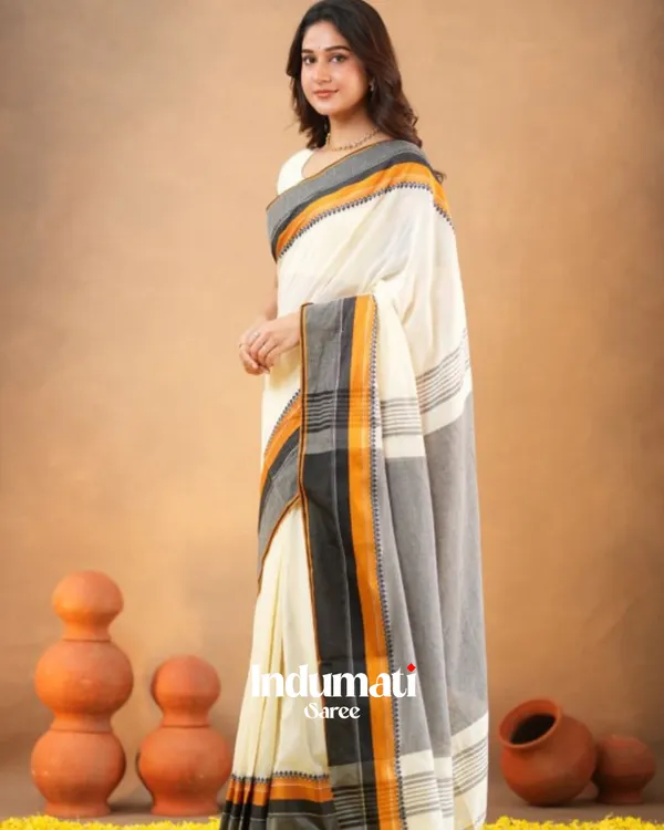 Classic_White_Traditional_Mulmul__Cotton_Saree_with_Contrast_Border_&_Blouse_Piece