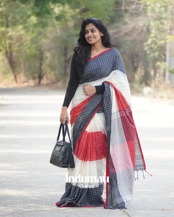 Ragini_Mala_-_Graceful_Black-White-Red_Linen_Saree_with_Subtle_Red_Border_&_Blouse_Piece