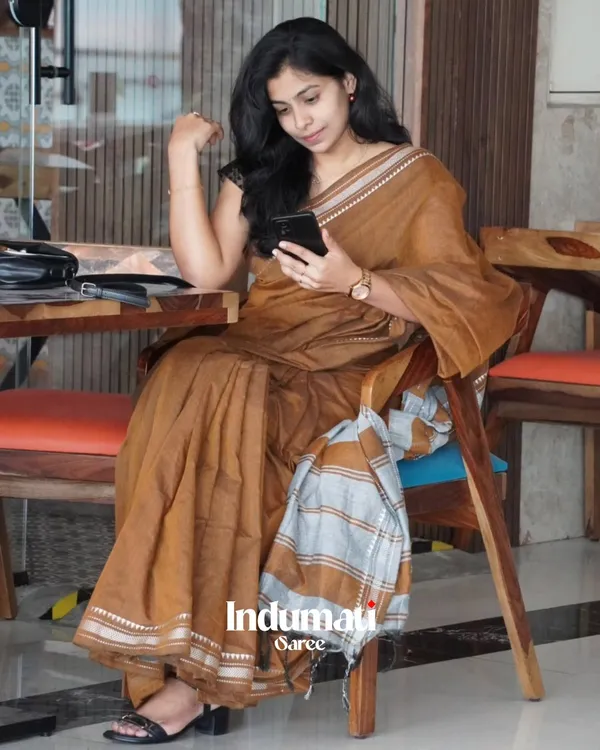 Tejas_Dhara_-_Saffron_Linen_Saree_with_Silver_Border_Design_&_Blouse_Piece