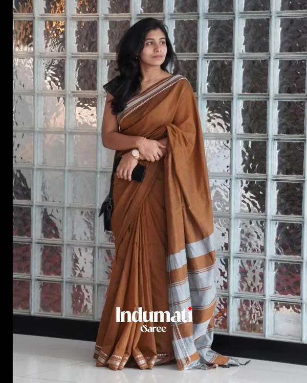 Tejas_Dhara_-_Saffron_Linen_Saree_with_Silver_Border_Design_&_Blouse_Piece