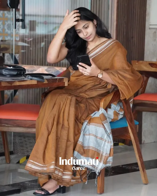 Tejas_Dhara_-_Saffron_Linen_Saree_with_Silver_Border_Design_&_Blouse_Piece
