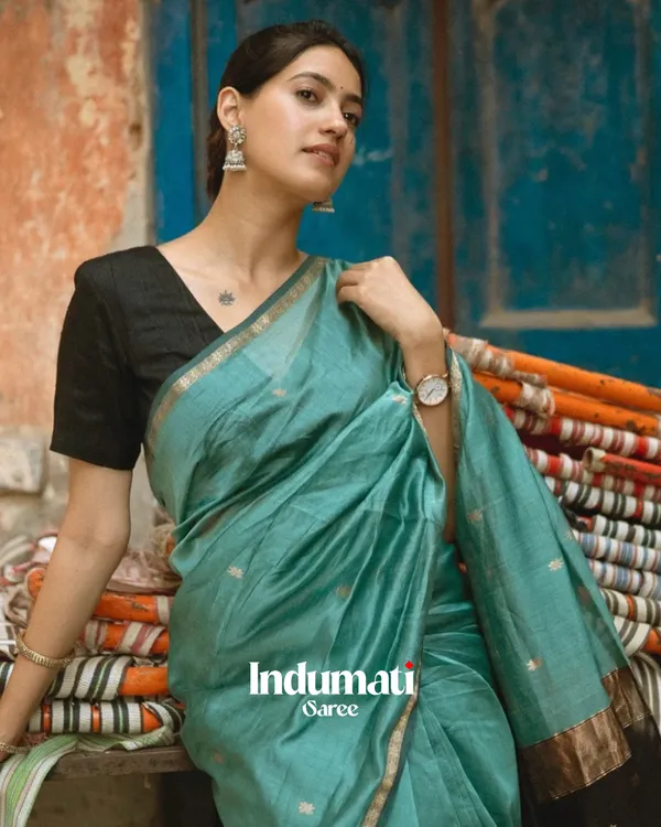Bottle_Green_And_Black_Premium_Cotton_Silk_Saree_With_Classy_Blouse_and_tassels