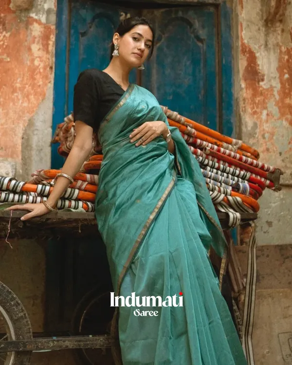 Bottle_Green_And_Black_Premium_Cotton_Silk_Saree_With_Classy_Blouse_and_tassels