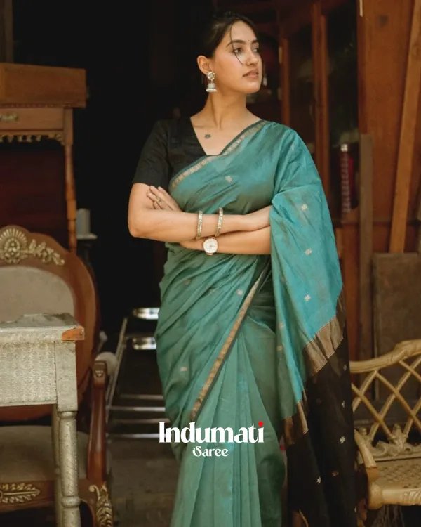 Bottle_Green_And_Black_Premium_Cotton_Silk_Saree_With_Classy_Blouse_and_tassels