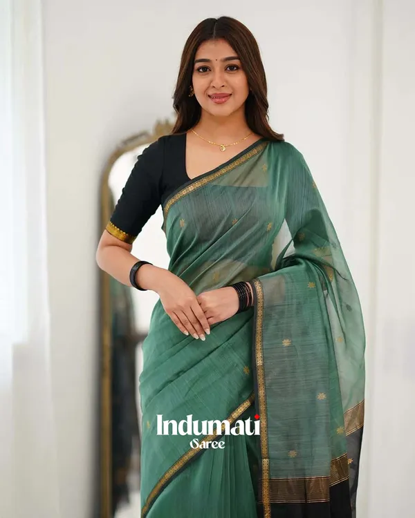 Bottle_Green_Premium_Cotton_Silk_Saree_With_Classy_Blouse_and_tassels