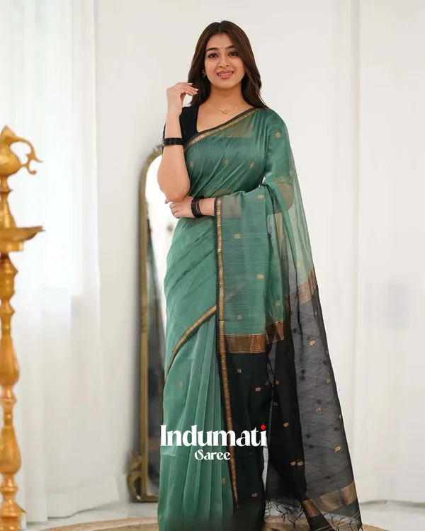 Bottle_Green_Premium_Cotton_Silk_Saree_With_Classy_Blouse_and_tassels
