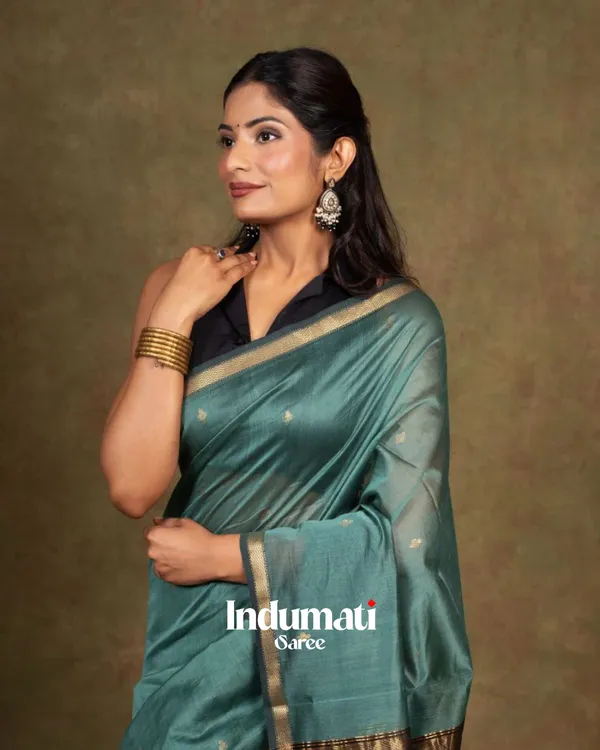 Bottle_Blue_And_Black_Premium_Cotton_Silk_Saree_With_Classy_Blouse_and_tassels