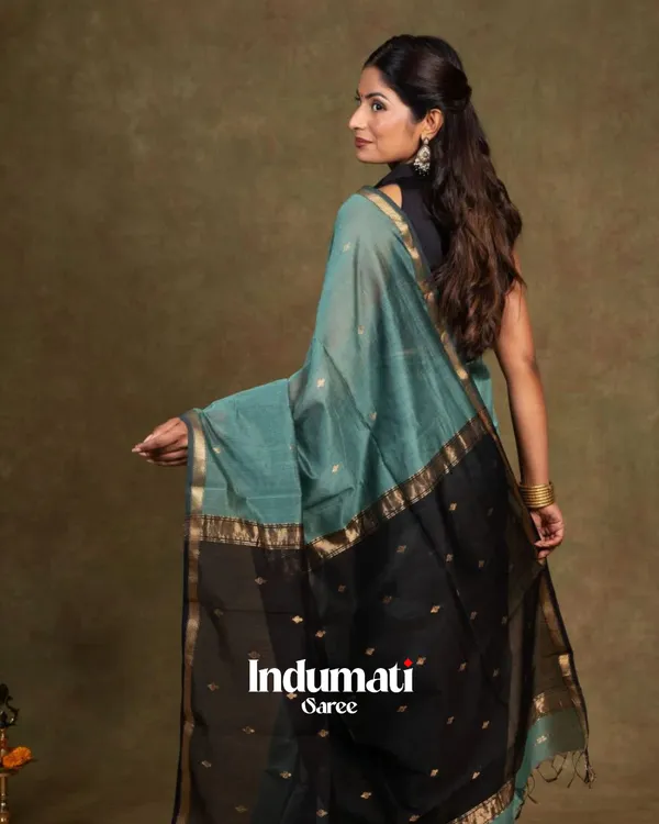 Bottle_Blue_And_Black_Premium_Cotton_Silk_Saree_With_Classy_Blouse_and_tassels