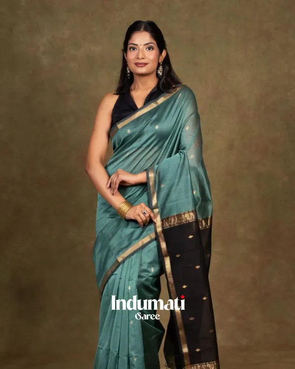 Bottle_Blue_And_Black_Premium_Cotton_Silk_Saree_With_Classy_Blouse_and_tassels