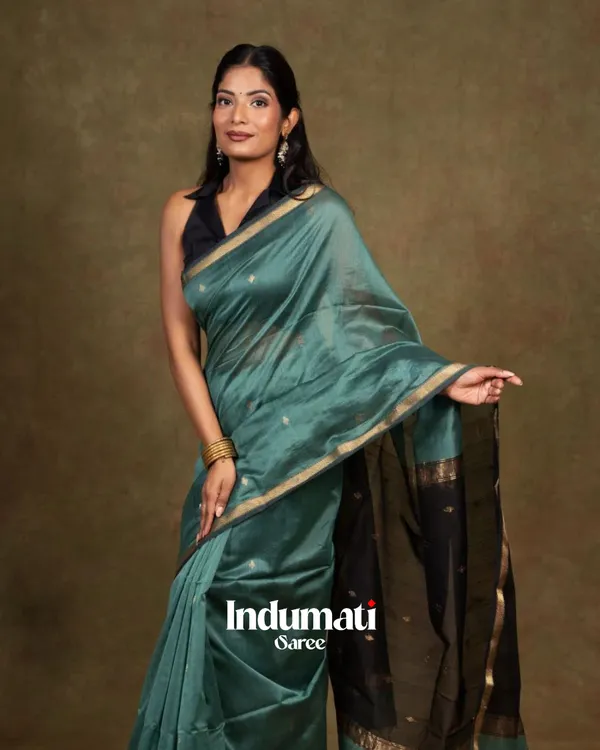 Bottle_Blue_And_Black_Premium_Cotton_Silk_Saree_With_Classy_Blouse_and_tassels