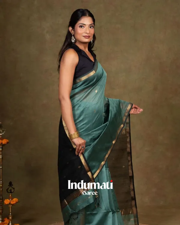 Bottle_Blue_And_Black_Premium_Cotton_Silk_Saree_With_Classy_Blouse_and_tassels