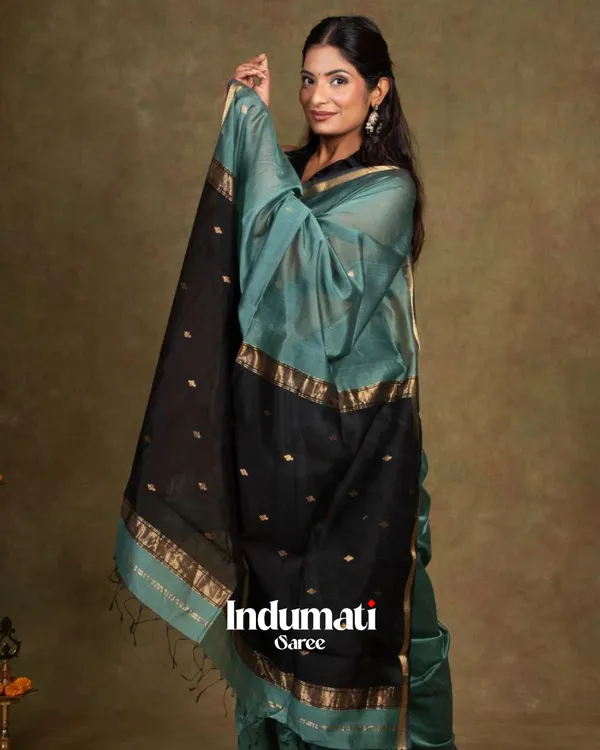 Bottle_Blue_And_Black_Premium_Cotton_Silk_Saree_With_Classy_Blouse_and_tassels