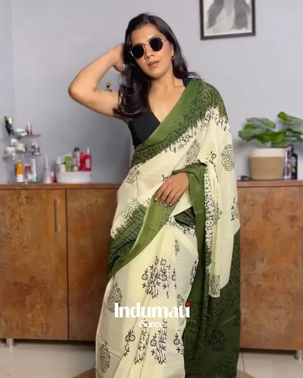 Leaf_Aura_-_Green_Linen_Saree_with_Oversized_Flower_Motifs_&_Black_Blouse
