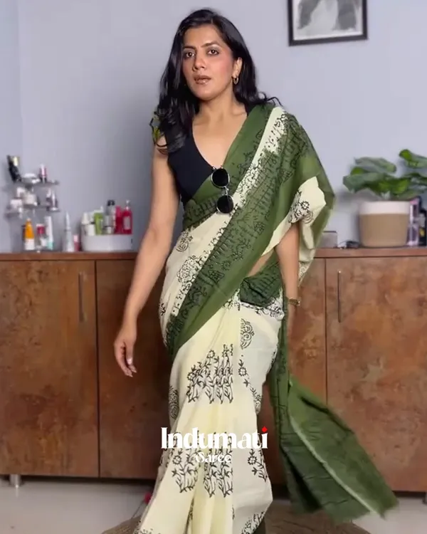 Leaf_Aura_-_Green_Linen_Saree_with_Oversized_Flower_Motifs_&_Black_Blouse