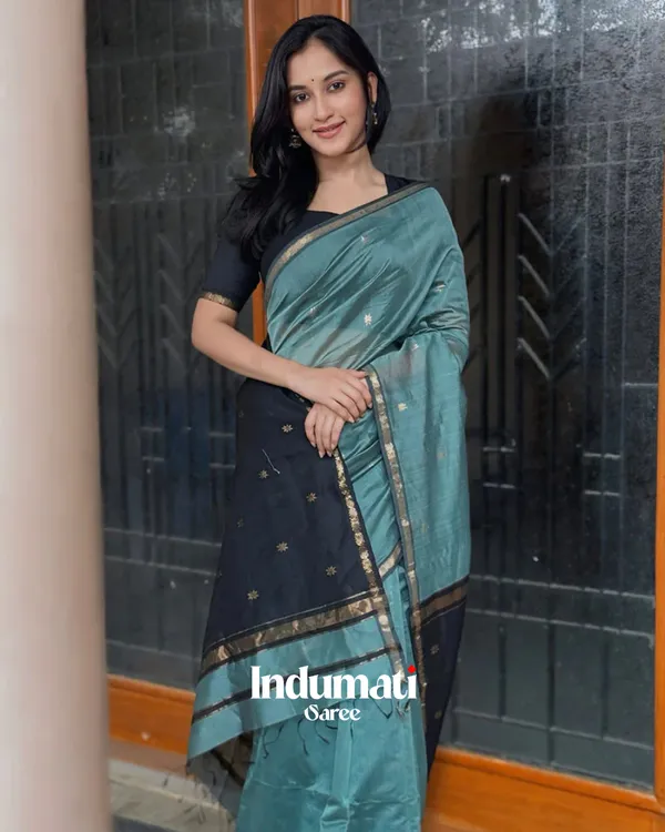 Bottle_Green_And_Black_Premium_Cotton_Silk_Saree_With_Classy_Blouse_and_tassels