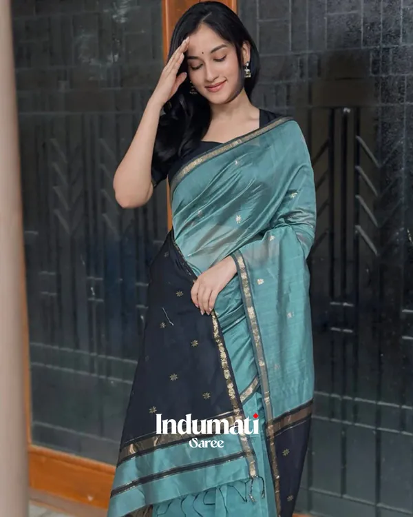 Bottle_Green_And_Black_Premium_Cotton_Silk_Saree_With_Classy_Blouse_and_tassels