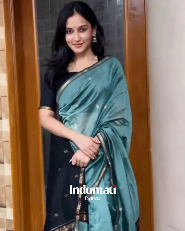 Bottle_Green_And_Black_Premium_Cotton_Silk_Saree_With_Classy_Blouse_and_tassels