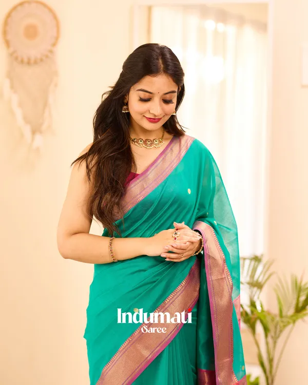 Bottle_Green_Color_Premium_Cotton_Silk_Saree_With_Classy_Blouse_and_tassels