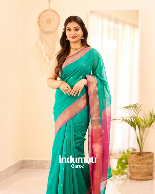 Bottle_Green_Color_Premium_Cotton_Silk_Saree_With_Classy_Blouse_and_tassels