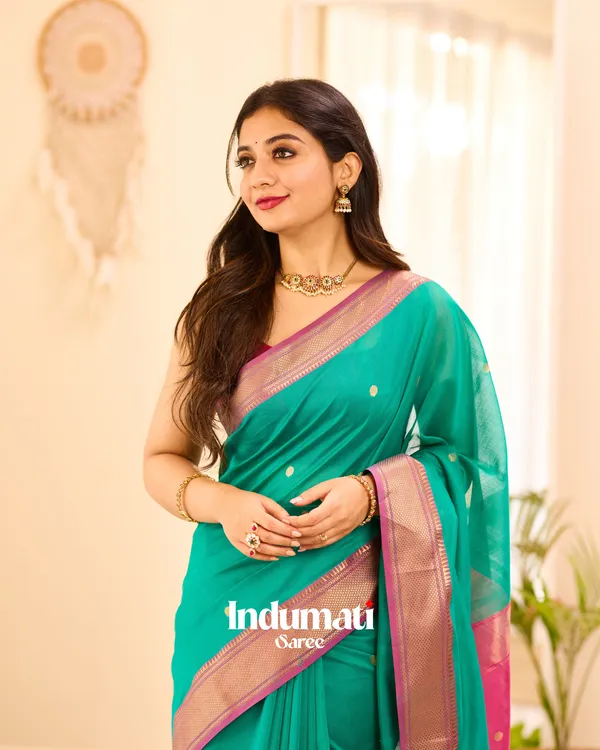 Bottle_Green_Color_Premium_Cotton_Silk_Saree_With_Classy_Blouse_and_tassels