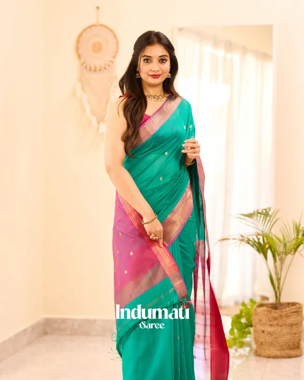 Bottle_Green_Color_Premium_Cotton_Silk_Saree_With_Classy_Blouse_and_tassels