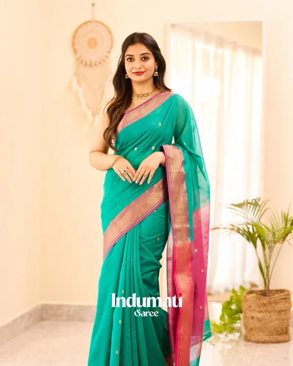 Bottle_Green_Color_Premium_Cotton_Silk_Saree_With_Classy_Blouse_and_tassels
