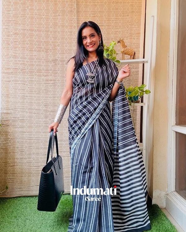 Black_Rhythm_-_Black_Saree_Linen_Saree_with_Lining_Pattern_&_Coordinated_Blouse