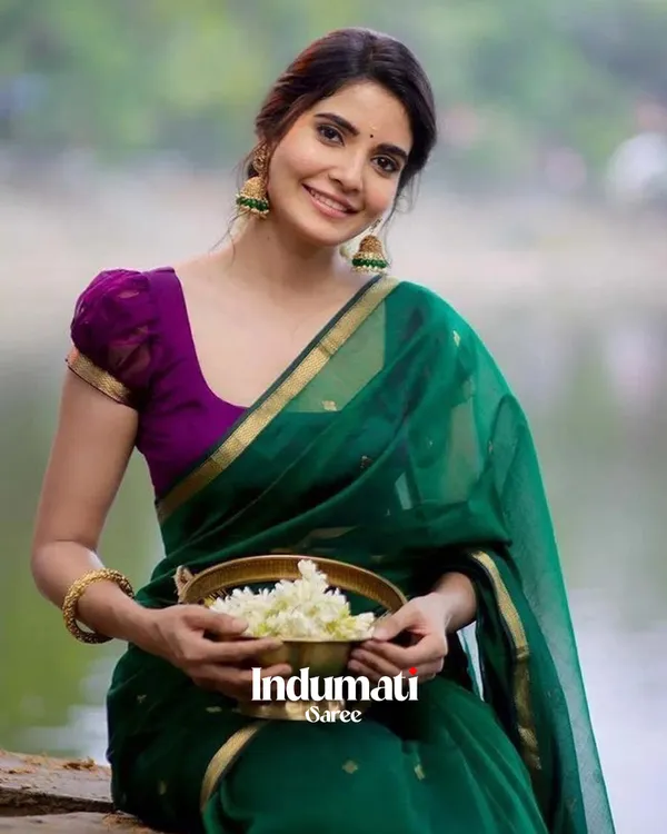 Green_Color_Premium_Cotton_Silk_Saree_With_Classy_Purple_Blouse_and_tassels