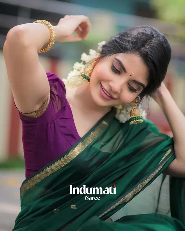 Green_Color_Premium_Cotton_Silk_Saree_With_Classy_Purple_Blouse_and_tassels