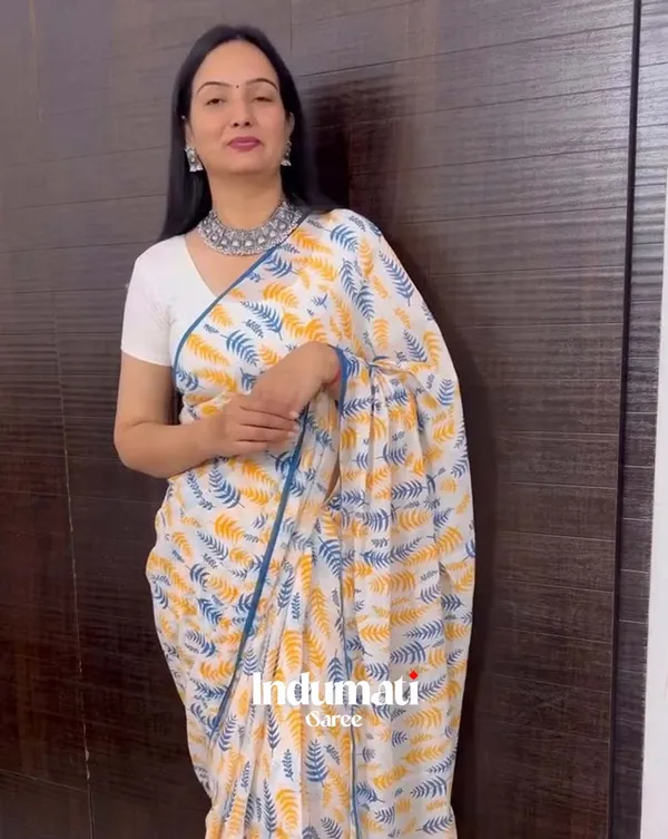 Icy_Edge_-_White_Linen_Saree_with_Small_Blue_Border_&_White_Blouse