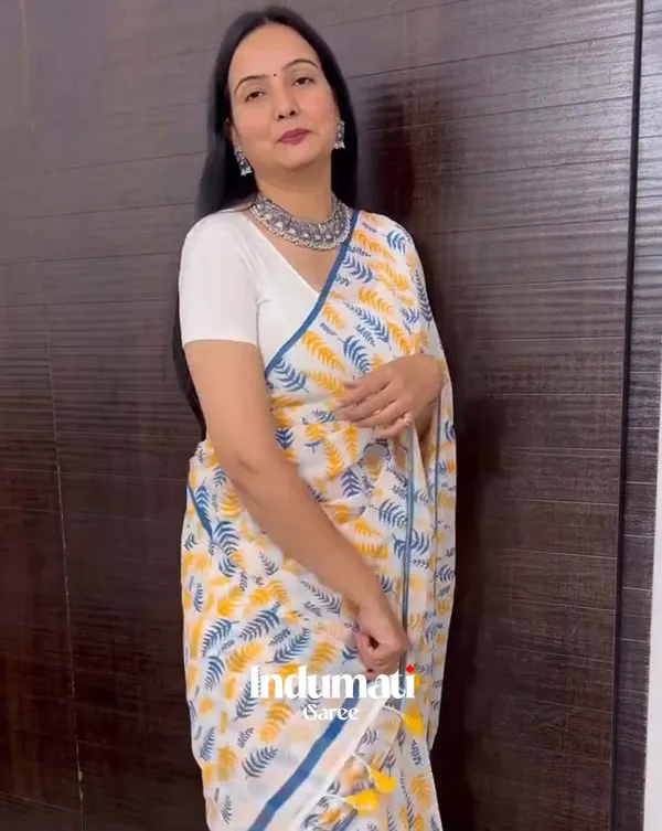Icy_Edge_-_White_Linen_Saree_with_Small_Blue_Border_&_White_Blouse
