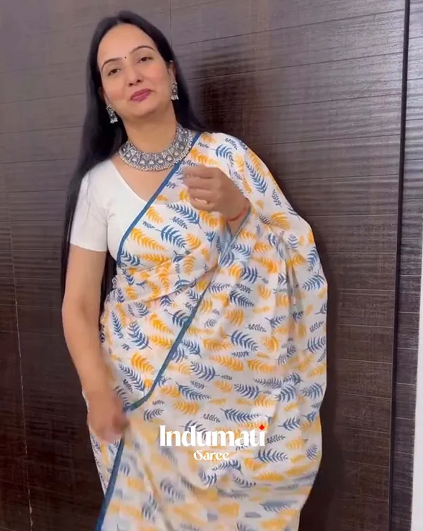 Icy_Edge_-_White_Linen_Saree_with_Small_Blue_Border_&_White_Blouse