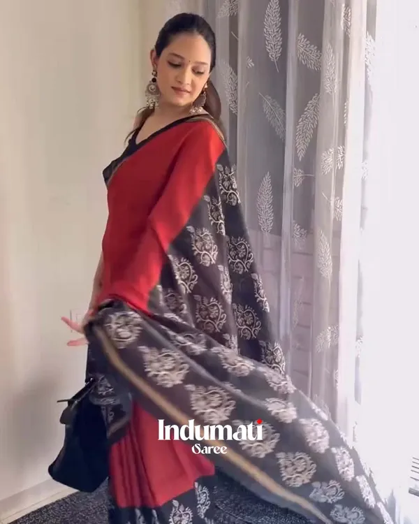 Red_Eclipse_-_Red_Linen_Saree_with_Black_Blouse_and_Black_Border