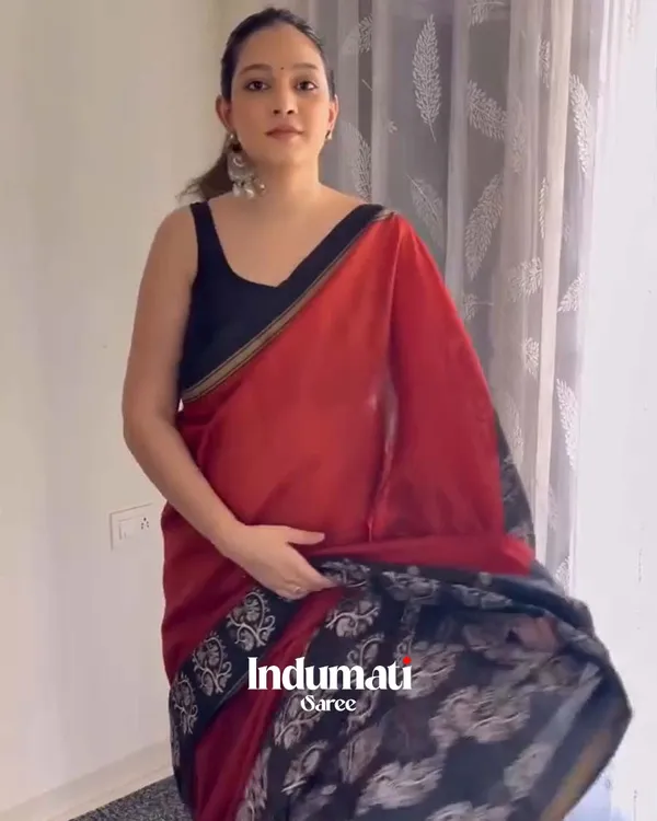 Red_Eclipse_-_Red_Linen_Saree_with_Black_Blouse_and_Black_Border