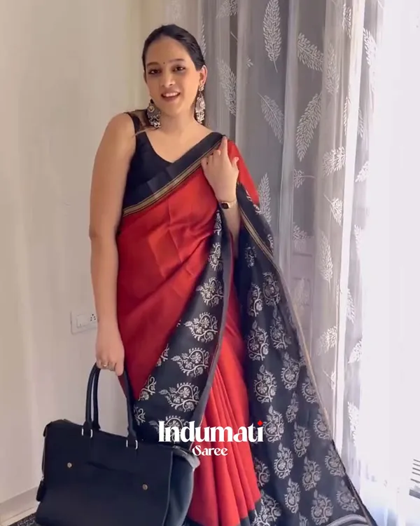 Red_Eclipse_-_Red_Linen_Saree_with_Black_Blouse_and_Black_Border