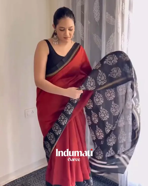 Red_Eclipse_-_Red_Linen_Saree_with_Black_Blouse_and_Black_Border