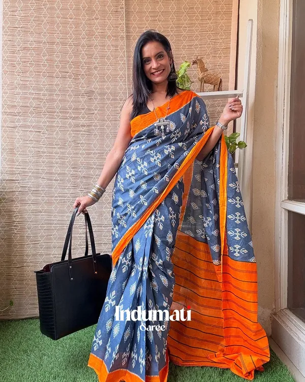 Neel_Kesari_-_Blue_Linen_Saree_with_Saffron_Edge_&_Black_Blouse