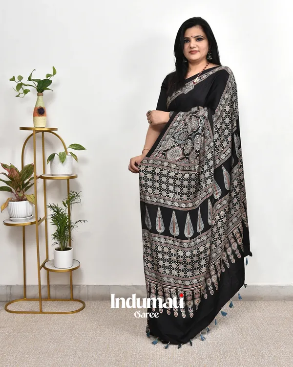 Black_Ajrakh_Printed_Modal_Silk_Premium_Plain_Saree_with_Fancy_Pallu_and_Blouse_Piece