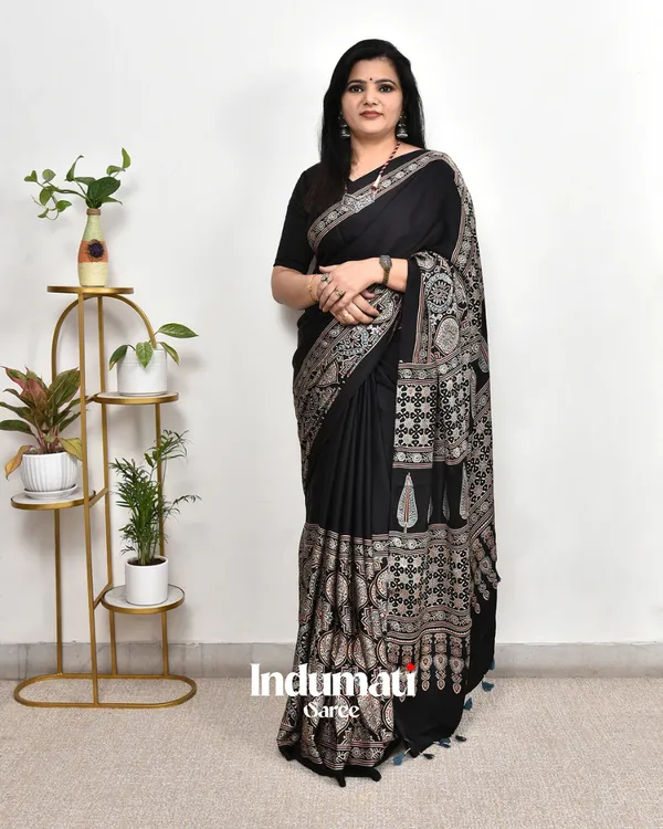 Black_Ajrakh_Printed_Modal_Silk_Premium_Plain_Saree_with_Fancy_Pallu_and_Blouse_Piece
